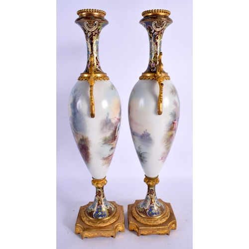 53 - A LARGE LATE 19TH CENTURY FRENCH SEVRES PORCELAIN VASES with champleve enamel mounts. 39 cm high.