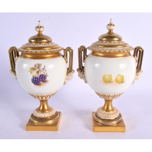 535 - A FINE PAIR OF TWIN HANDLED ROYAL WORCESTER VASES AND COVERS by Freeman & another, painted with frui... 