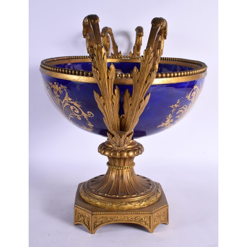 555 - A VERY LARGE 19TH CENTURY FRENCH ORMOLU AND SEVRES PORCELAIN CENTRE PIECE painted with figures in la... 