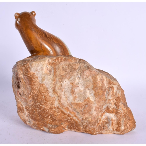 592 - A CONTINENTAL CARVED ONYX SQUIRREL. 28 cm x 10 cm.