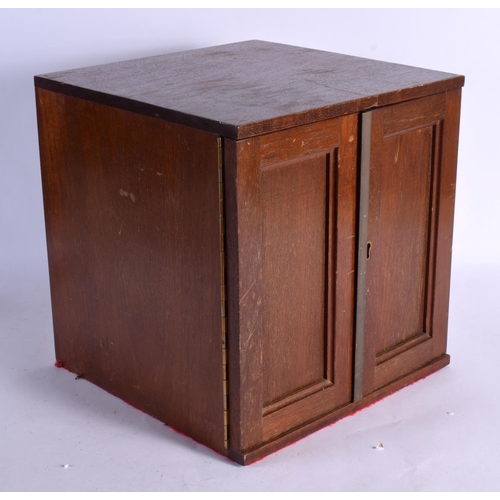 597 - AN ANTIQUE COIN COLLECTORS CABINET. 38 cm x 28 cm.