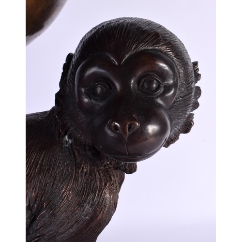 602 - A LARGE CONTEMPORARY BRONZE FIGURE OF A MONKEY. 40 cm x 32 cm.