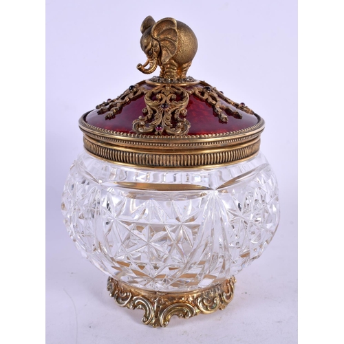 624 - A FINE CONTINENTAL SILVER AND ENAMEL JEWELLED CUT GLASS JAR AND COVER with elephant finial. 14 cm x ... 