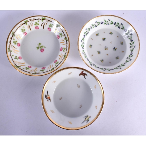 63 - THREE LATE 19TH CENTURY FRENCH PARIS PORCELAIN CUPS AND SAUCERS painted with flowers. (6)