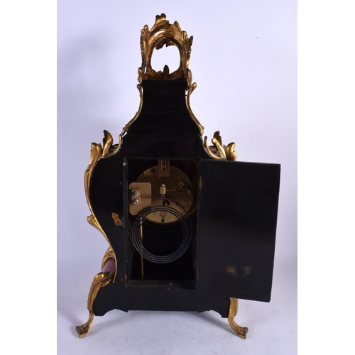 657 - AN ANTIQUE BRONZE AND TORTOISESHELL MANTEL CLOCK. 46 cm x 22 cm.