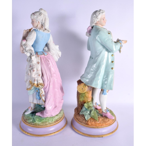 74 - A LARGE PAIR OF 19TH CENTURY FRENCH PARIS PORCELAIN FIGURES modelled upon naturalistic bases. 48 cm ... 