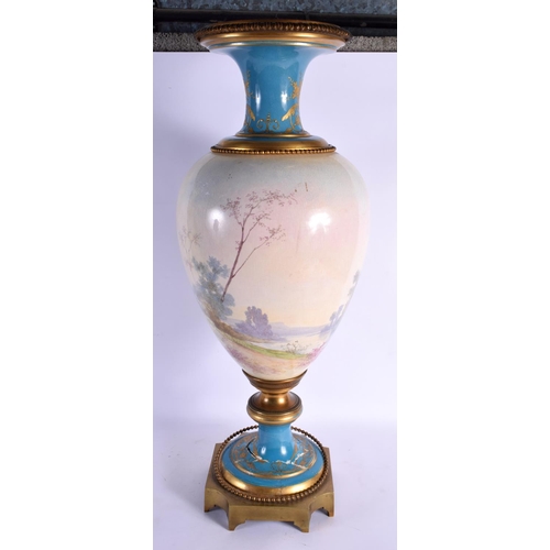 75 - A LARGE 19TH CENTURY FRENCH SEVRES PORCELAIN VASE painted with a female and child within a landscape... 