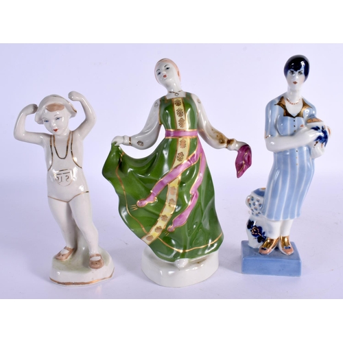 8 - A COLLECTION OF FIFTEEN UKRANIAN PORCELAIN FIGURES in various forms and sizes. (15)