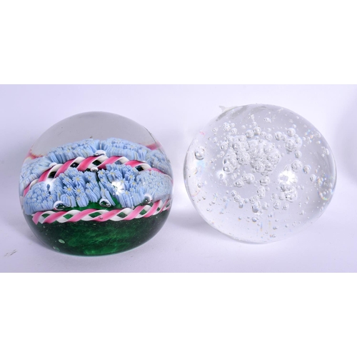 83 - A GROUP OF GLASS PAPERWEIGHTS. (7)