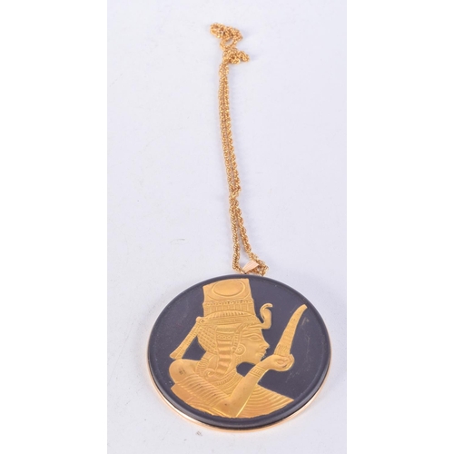 1002 - A WEDGWOOD PENDANT WITH 12CT GOLD FITTINGS.  Pendant 7.4cm diameter, chain 56cm long