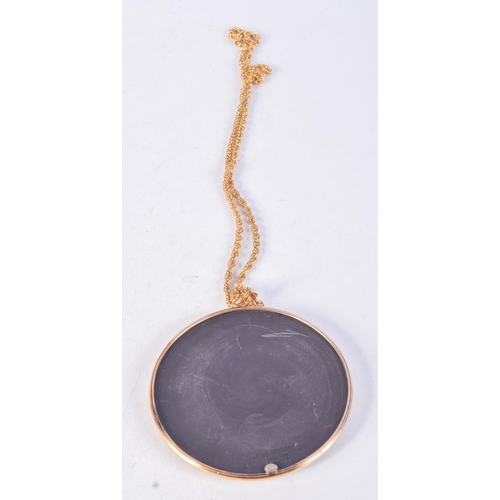 1002 - A WEDGWOOD PENDANT WITH 12CT GOLD FITTINGS.  Pendant 7.4cm diameter, chain 56cm long