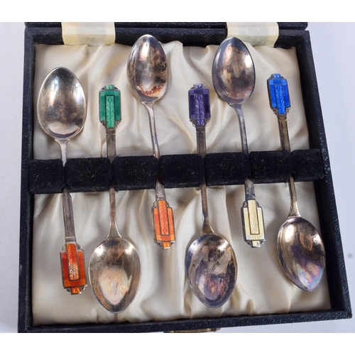 1040 - A CASED SET OF ART DECO STYLE SILVER & ENAMEL SPOONS.  Hallmarked Birmingham 1957.  10.8cm x 2.3cm, ... 