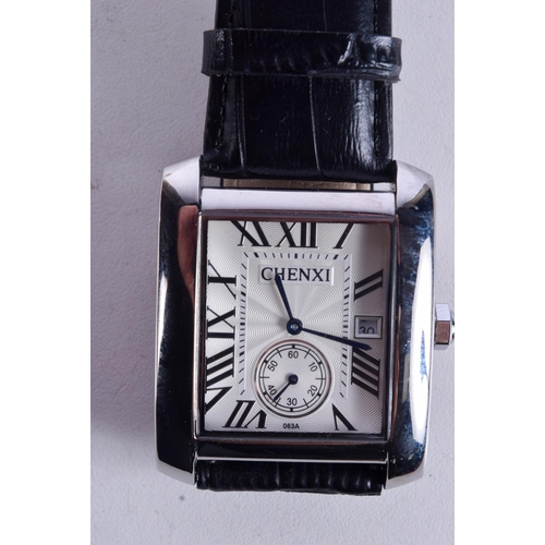 1045 - TWO GENTS FASHION WATCHES.  Largest 4.3cm incl crown (2)