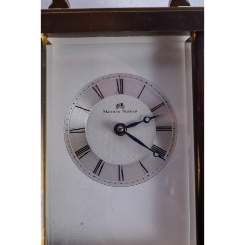 1090 - 2 X CARRIAGE CLOCKS.  10.5cm high, 1 with key