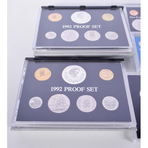 1101 - 7 NEW ZEALAND PROOF COIN SETS (7)