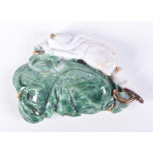 750 - A CHINESE TWO TONE JADE PENDANT WITH GOLD MOUNTS.  Stamped 14K 585, 6.5cm x 4.8cm x 1.4cm, weight 46... 