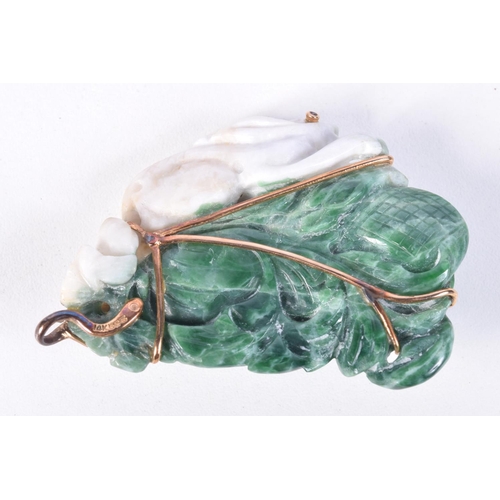 750 - A CHINESE TWO TONE JADE PENDANT WITH GOLD MOUNTS.  Stamped 14K 585, 6.5cm x 4.8cm x 1.4cm, weight 46... 