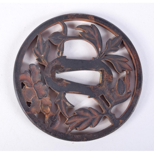 751 - A JAPANESE IRON TSUBA, SIGNED/  7.6cm diameter, weight 108.1g