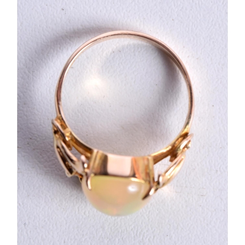 758 - A 14CT GOLD AND OPAL RING.  Stamped 14K, size N/O, weight 3.3g