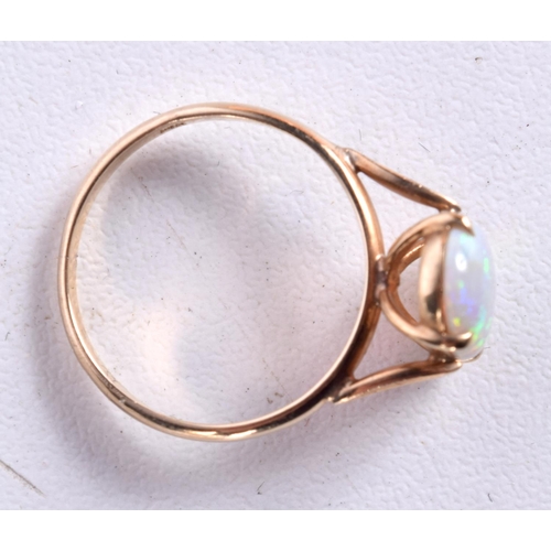 762 - A 14CT GOLD AND OPAL RING.  Stamped 14K, size J, weight 1.5g