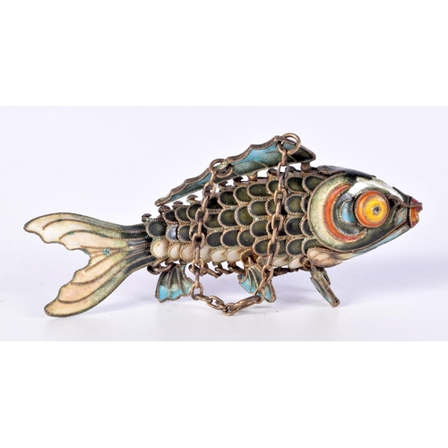 764 - A CLOISONNE ARTICULATED FISH PENDANT.  3.4cm x 7.4cm x 1.4cm, weight 18.7g