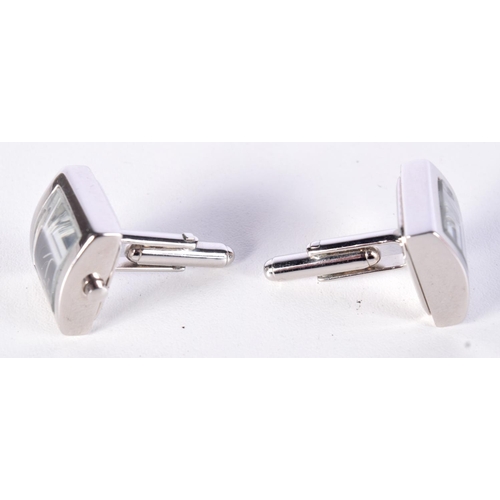 774 - A PAIR OF TATEOSSIAN WATCH CUFFLINKS.  1.8cm inc crown, weight 22.9g