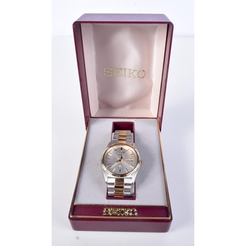 784 - BOXED SEIKO QUARTZ.  3.7cm incl crown, reversed inscribed