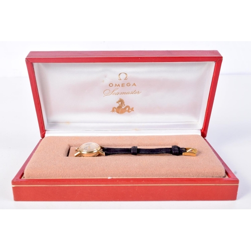 790 - OMEGA WATCH BOX WITH A LADIES OMEGA.  1.9cm diameter incl crown