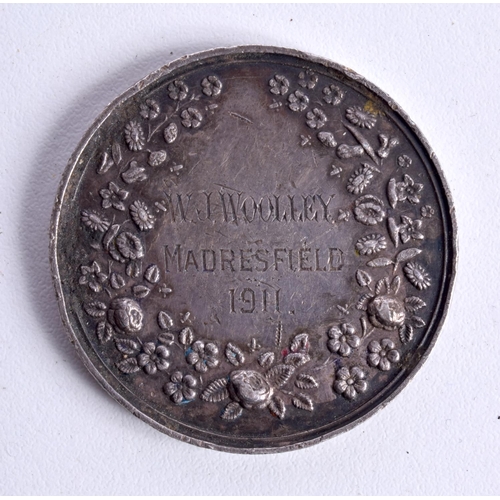 793 - A SILVER MEDALLION PRESENTED BY THE BRITISH BEEKEEPING ASSOCIATION IN 1911 TO W.J WOOLEY OF MADRESFI... 