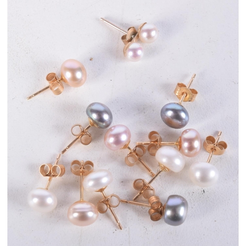 806 - TWELVE ASSORTED GOLD MOUNTED CULTURED PEARL EARRINGS.  0.6cm diameter, total weight 4.6g (12)