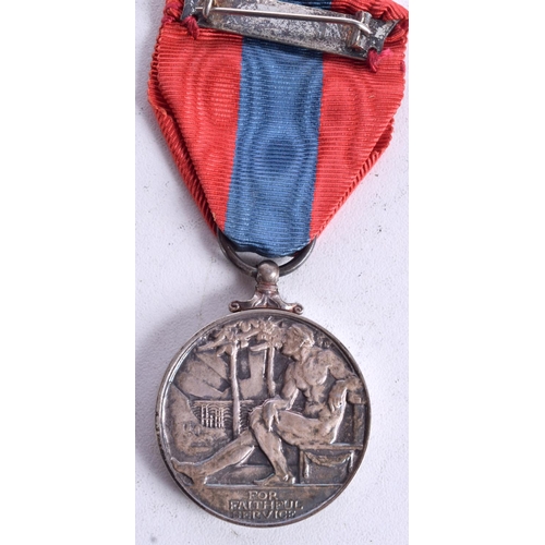 814 - AN IMPERIAL SERVICE MEDAL AWARDED TO ARTHUR LEONARD THOMAS