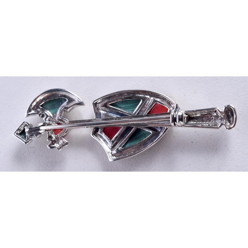 822 - A SILVER AND MALACHITE AXE AND SHIELD BROOCH.  Stamped Silver, 5.5cm x 2cm, weight 7.2g