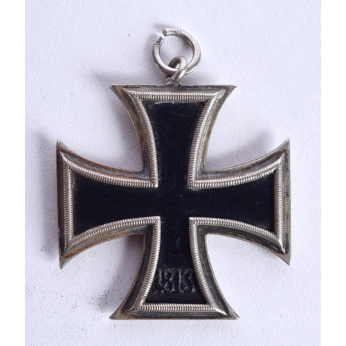 824 - A REPLICA GERMAN IRON CROSS MEDAL.  4.7cm x 4.2cm