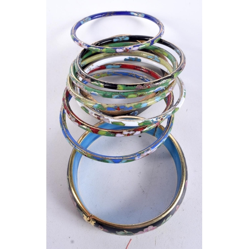 831 - NINE CLOISONNE BANGLES.  (9)