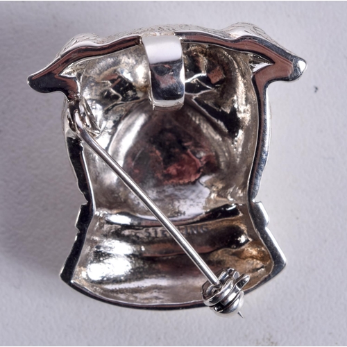 855 - A SILVER DOG BROOCH WITH GEM SET EYES.  Stamped Sterling, 2.8cm x 2.6cm, weight 12.1g