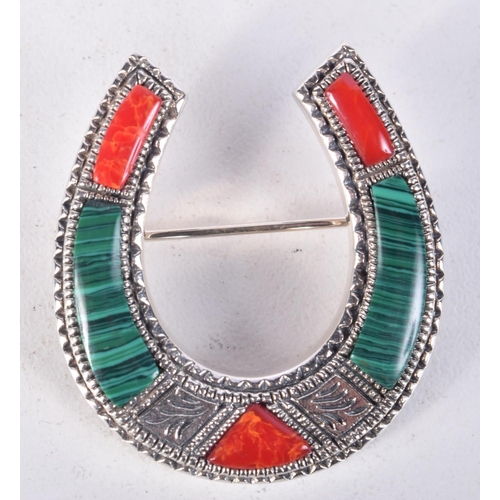 856 - A SILVER AND MALACHITE HORSESHOE BROOCH.  Stamped Sterling, 3.3cm x 3cm, weight 9.5g