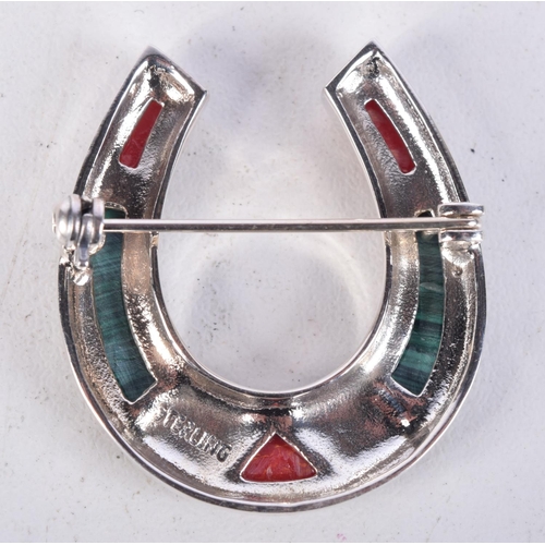 856 - A SILVER AND MALACHITE HORSESHOE BROOCH.  Stamped Sterling, 3.3cm x 3cm, weight 9.5g