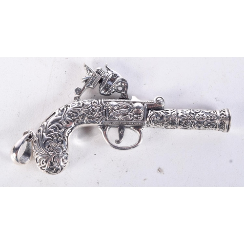 857 - A MINIATURE SILVER PISTOL WHISTLE PENDANT.  7.2cm x 3.6cm, weight 22.7g