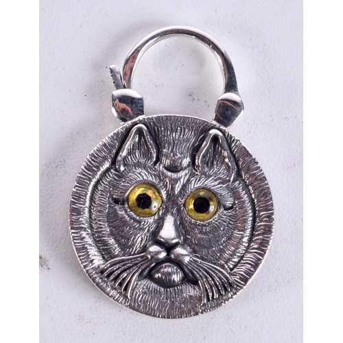 858 - A SILVER CAT PADLOCK PENDANT WITH GEM SET EYES.  Stamped Silver, 3.8cm x 2.6cm, weight 10g