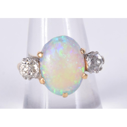 866 - ANTIQUE DIAMOND AND OPAL RING