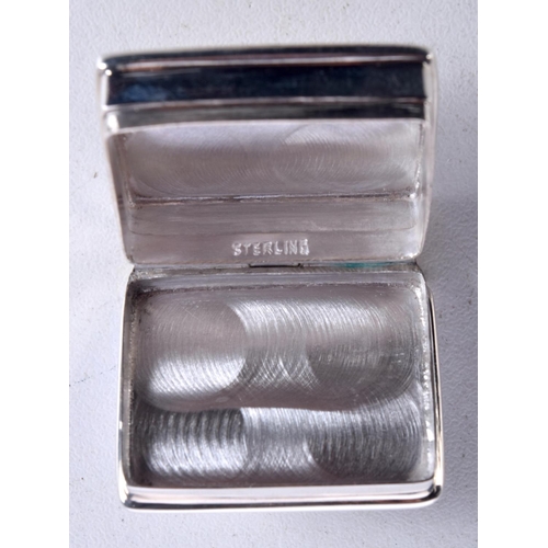 872 - A STERLING SILVER GOLFER PILL BOX.  Stamped Sterling, 3.2cm x 2.6cm x 1.4cm, weight 20.5g