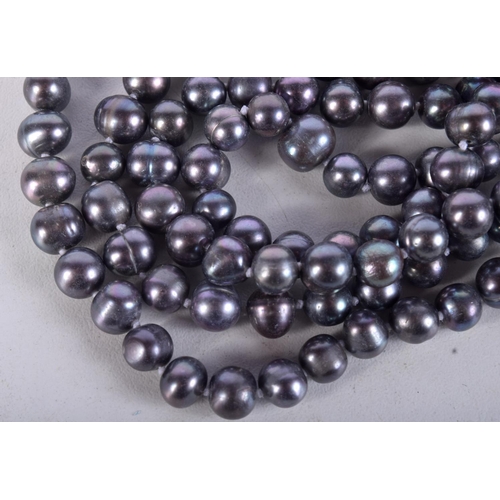 935 - A STRING OF GREY PEARLESCENT BEADS.  Length 118cm, bead size 5.8mm