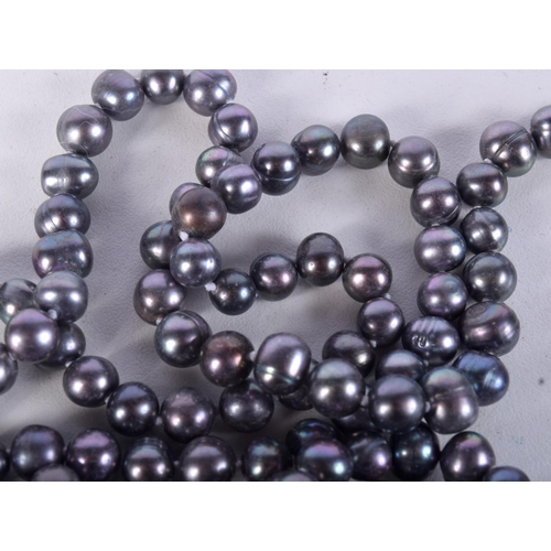 935 - A STRING OF GREY PEARLESCENT BEADS.  Length 118cm, bead size 5.8mm