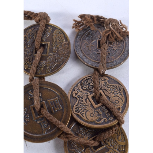 944 - FIVE CHINESE COINS.  Each 4cm diameter, total weight 151.8g