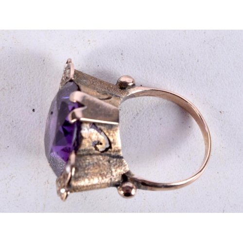 954 - A GOLD, DIAMOND AND AMETHYST RING.  Size L. weight 8.7g