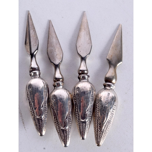 963 - EIGHT SILVER CORN ON THE COB HOLDERS.  Stamped Sterling, 7.3cm long, total weight 71.4g