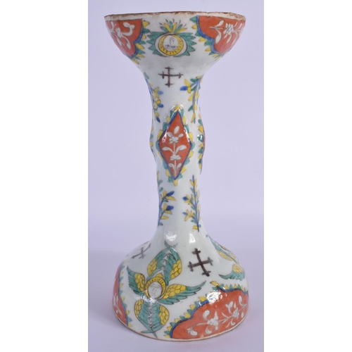 1515 - A LARGE OTTOMAN TURKISH KUTAHYA RELIGIOUS CANDLE STICK painted with figures. 24 cm high.