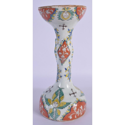 1515 - A LARGE OTTOMAN TURKISH KUTAHYA RELIGIOUS CANDLE STICK painted with figures. 24 cm high.