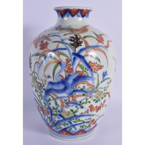 1517 - A 19TH CENTURY JAPANESE MEIJI PERIOD IMARI PORCELAIN VASE painted with birds. 22.5 cm high.