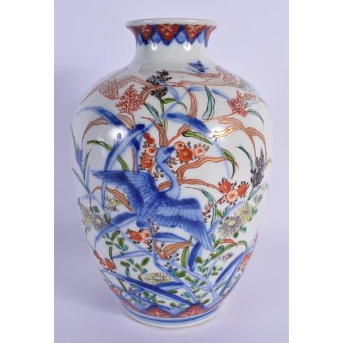 1517 - A 19TH CENTURY JAPANESE MEIJI PERIOD IMARI PORCELAIN VASE painted with birds. 22.5 cm high.